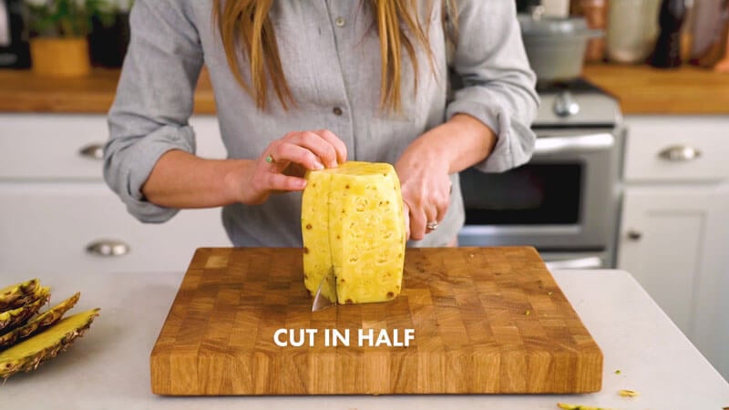 How to Cut a Pineapple | Cut in half